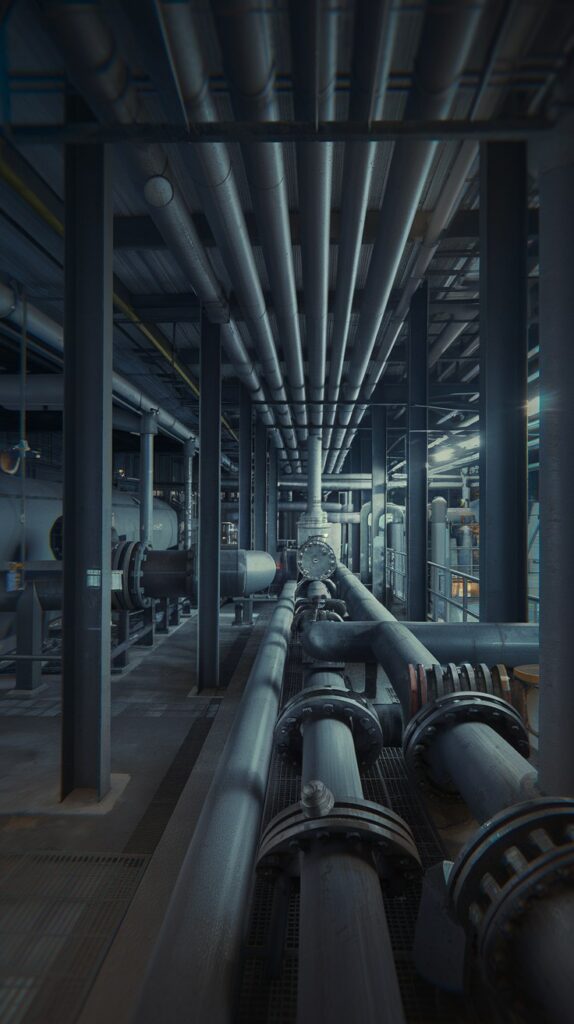 Industrial chemical processing plant with extensive pipe systems, valves and flanges